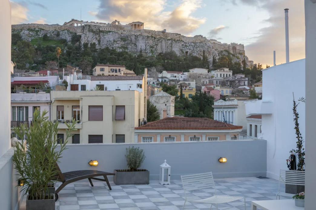 Rooftop terrace with a direct view of the Acropolis at an Estiano residence